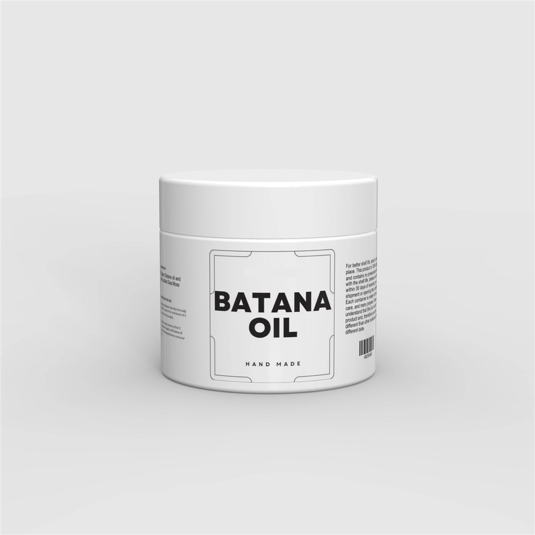 Batana and sea moss duo set with two 4oz amber bottles on a warm neutral background